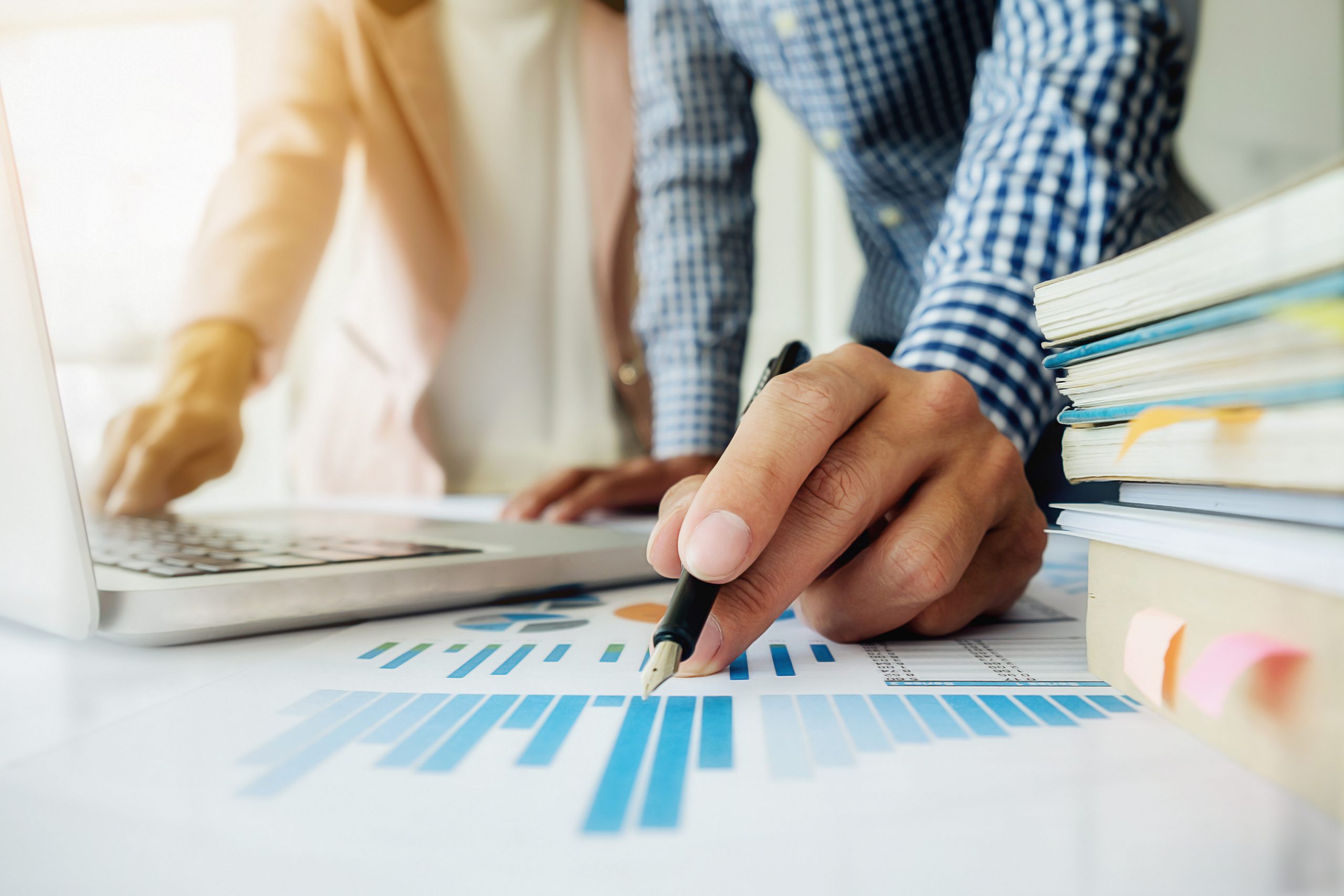 Business people discussing the charts and graphs showing the res