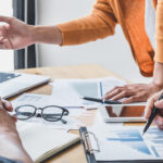 Business team collaboration discussing working analyzing with fi